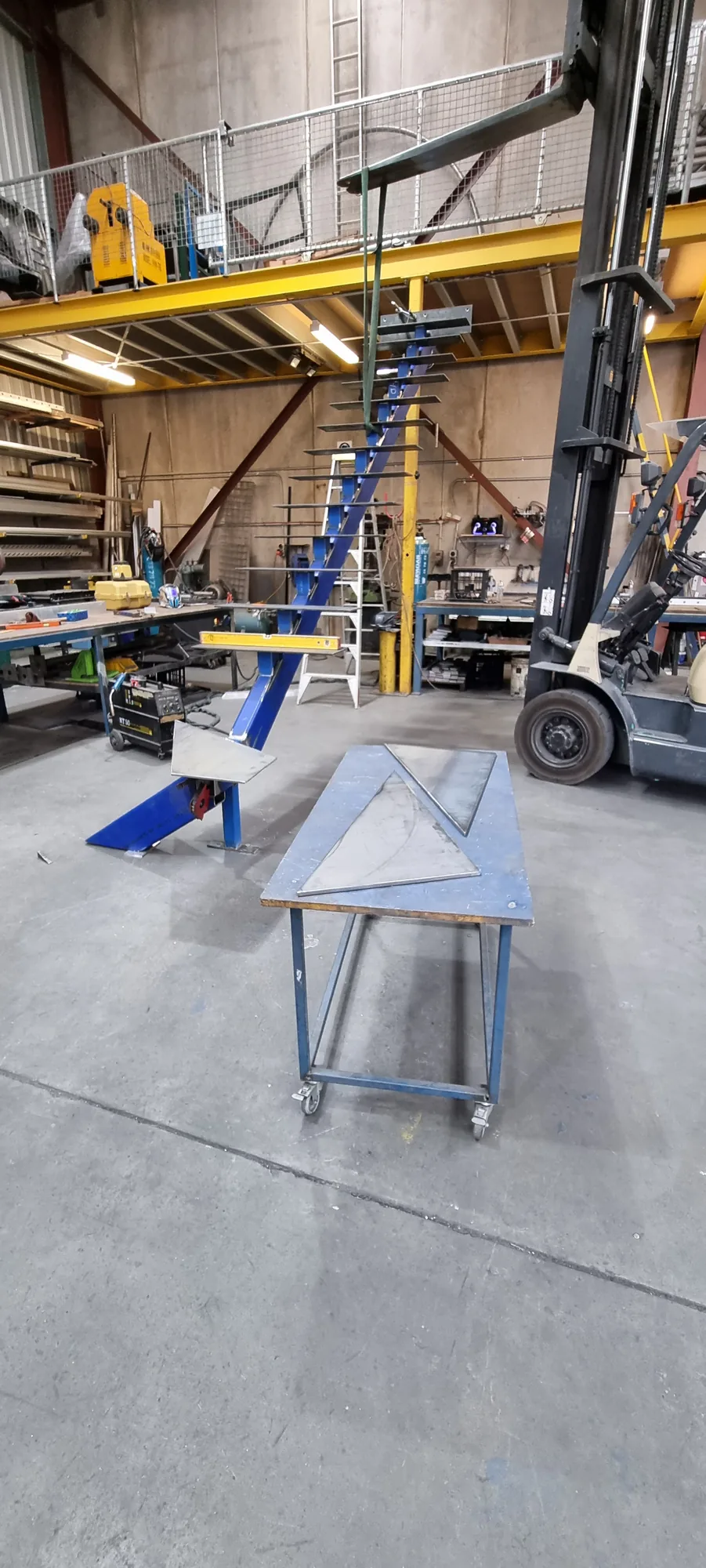 Fabricating a large steel frame using the workshop gantry crane.